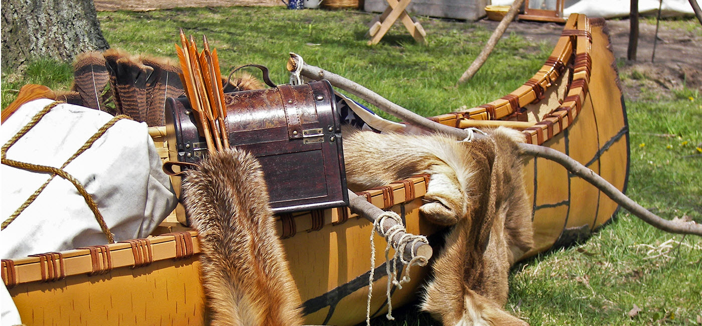 Canoe with pelts and camping supplies!''